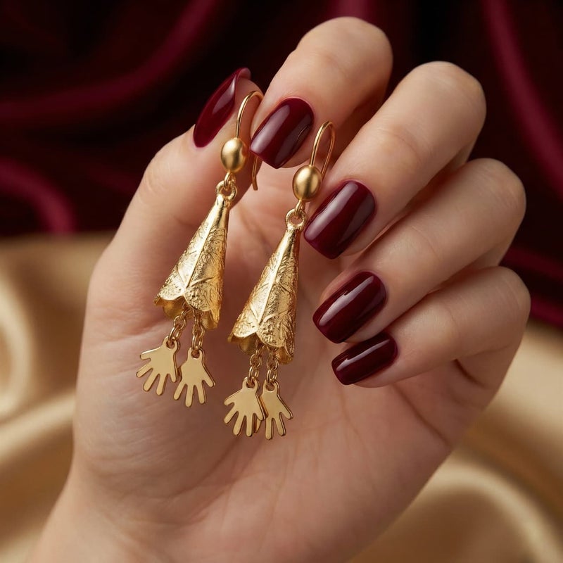 Gold-plated, cone-shaped drop earrings engraved with a "cone" design and delicate hand-shaped charms. A modern accessory that gives you an attractive and distinctive look for every occasion. - Image 4